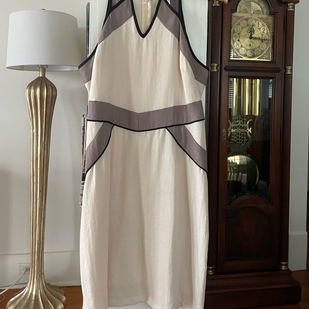 Modern block neutral colored adjustable strap, apron collar with cutouts dress